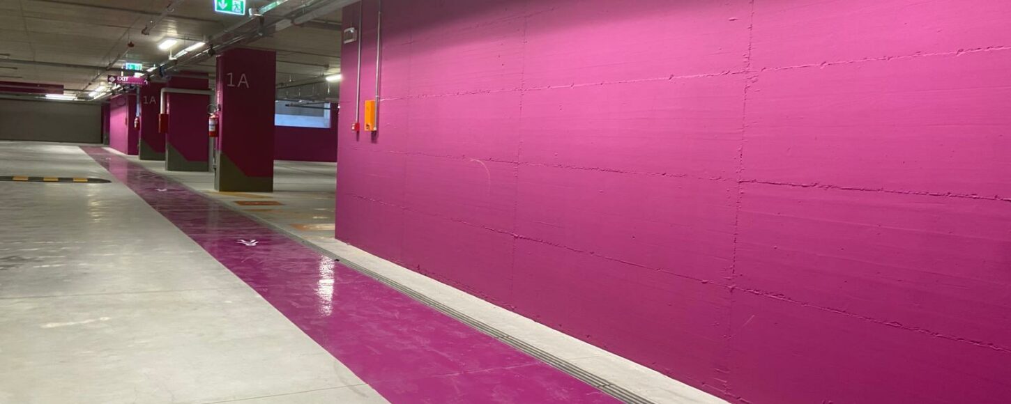 Parcheggio Politecnico di Torino: percorsi in resina, tinteggiatura pareti e pilastri